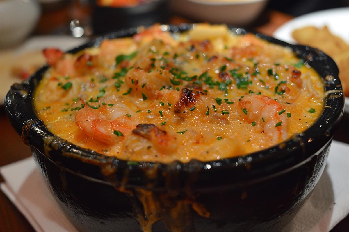 Crab Brulee topped with caramelized sugar crust in a ramekin