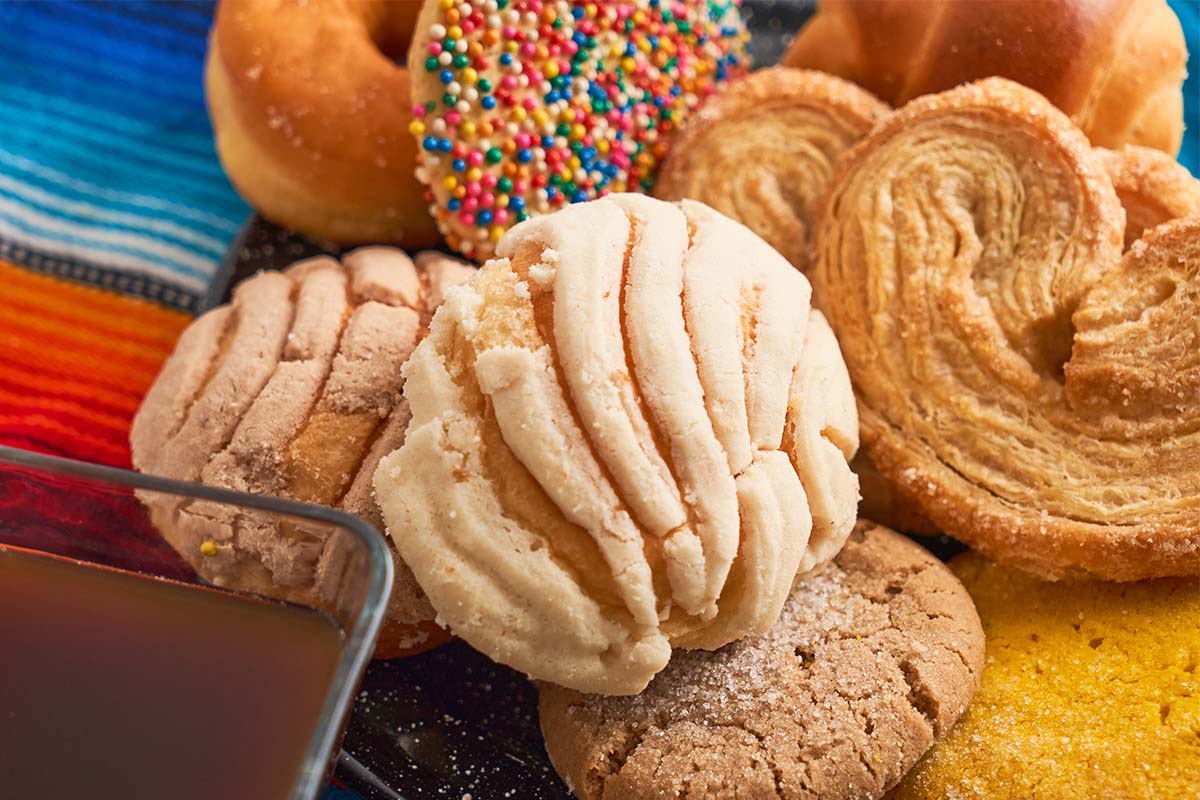 Colorful Conchas, the most popular Mexican bread, with a distinctive shell-shaped sugar topping.